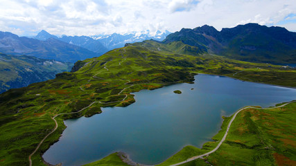 Fototapeta na wymiar Flight over the wonderful nature of Switzerland - the Swiss Alps from above - travel photography