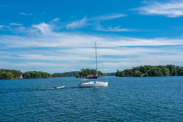 Fototapeta na wymiar Canadian boat sails to the islands