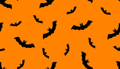 Vector illustration. Seamless pattern with bats isolated on orange. Hand drawn simple doodle clipart in a trendy style. Halloween theme. For banner, cards, wrapping, autumn projects, fabric, textile.