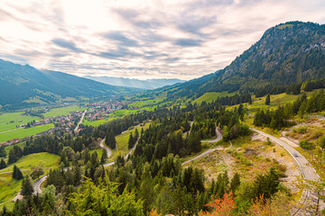 Fototapeta na wymiar Car in mountains of Bavaria, Germany, Europe