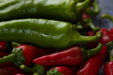 Group of Red hot chilli peppers close-up on a dark backgroundм