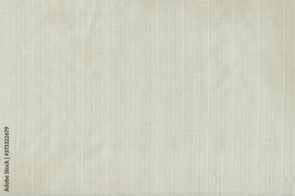 Poster grunge texture of light natural fabric. abstract monochrome background of soft fabric with vertical 