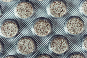 blisters with pills close up home first aid kit