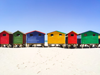 Colorful beach houses on the beach of Muizenberg in a long row - South Africa, Eastern Cape