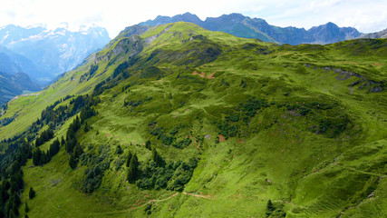 Amazing nature of the Swiss Alps - the Melchsee Frutt district in Switzerland from above - travel...