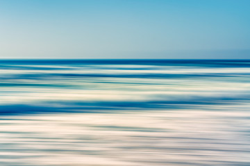 Fototapeta na wymiar Seascape abstract background, motion blur, light blue colors
