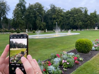 Woman taking photo on fountain