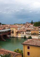 Fototapeta na wymiar The wooden covered Bridge, or Ponte degli Alpini, on the Brenta River, designed in 1569 by the architect Andrea Palladio