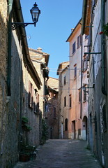 Charming narrow streets of Volterra town in Tuscany Italy