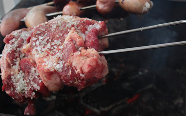 roasting charcoal barbecue, beef, sausage