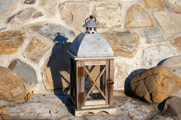 Church icon lamp for transporting fire on the stone wall