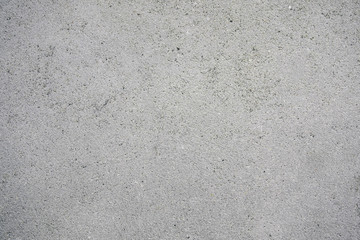 Gray concrete floor with a beautiful texture.  Surface for inscriptions or text.