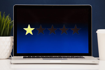 4 star rating or review in survey, poll, questionnaire or customer satisfaction research. Happy man giving positive feedback with tablet. Successful business with good reputation.