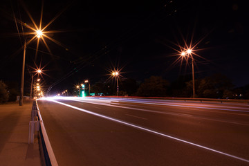 Night traffic on the highway with lights