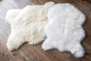 Natural sheep skin and synthetic on the laminate floor