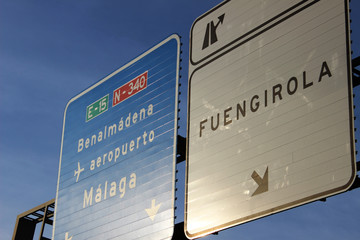 Road sign indicating the cities of Benalmádena and Fuengirola, in the province of Malaga (Spain)