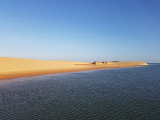 sand dunes and sea