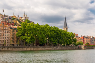 Vieux-Lyon, Saint-Georges church, colorful houses and footbridge in the center, on the river Saone