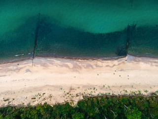 Beautiful landscape of Curonian spit on the Baltic sea with forest, beach and sea. aerial shot from...