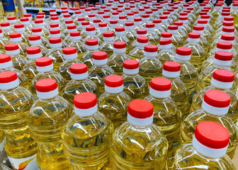 Sunflower oil warehouse close-up in a supermarket. Vegetarianism, healthy food