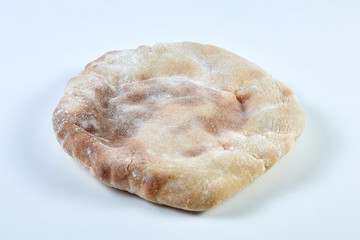 Isolate Bread Arabian or Pita bread on a white background.