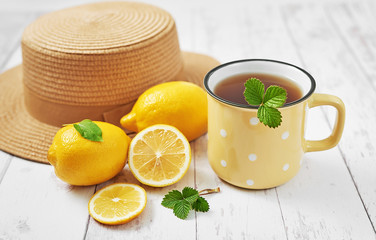 Tea with lemon. Cup of tea. Cozy morning. Healthy breakfast. Good morning. Health prevention. Vitamins. Citruses for colds, copy space. Aromatherapy. Food mood. Food and drink, still life health care