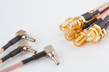 High-frequency ipx to sma female cable connector with gold plated pins background