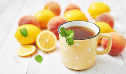 Fruit lemons and peaches on white background. Summer postcard. Hello summer! Harvesting. Healthy food and nutrition. Fruit background. Healthy cozy breakfast. Natural organic products. Vitamins
