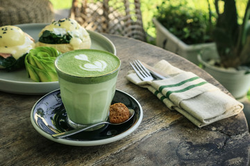 Matcha latte with latte art on top