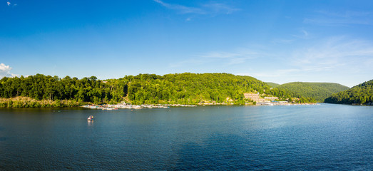 Naklejka premium Wide panoramic view of Cheat Lake near Morgantown in West Virginia from aerial drone shot above the water