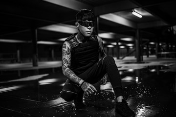 Man in the night city. Portrait of a man with Asian appearance in a neon city.