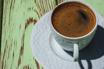 coffee cup on wooden background