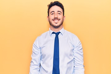 Young hispanic man wearing business clothes with a happy and cool smile on face. lucky person.