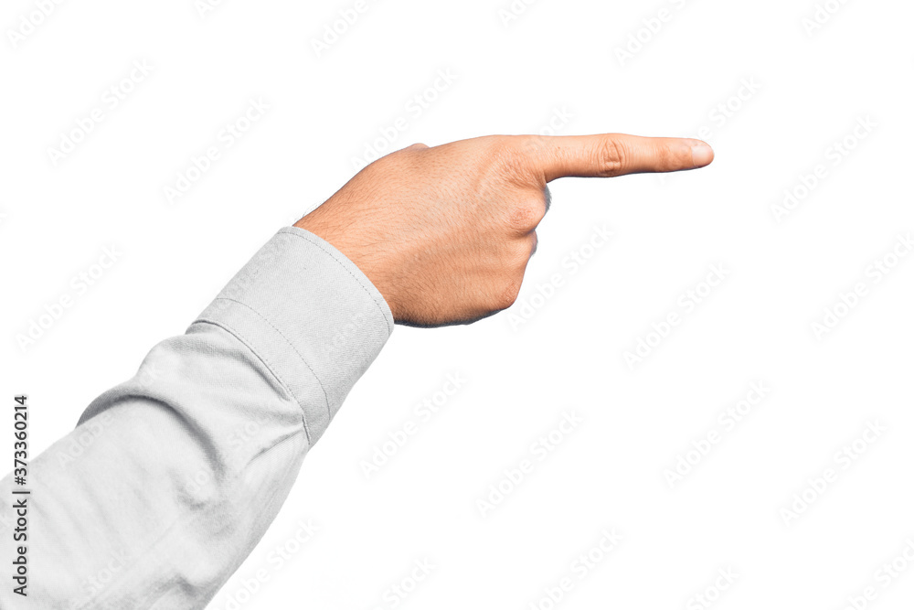 Wall mural hand of caucasian young man showing fingers over isolated white background pointing with index finge