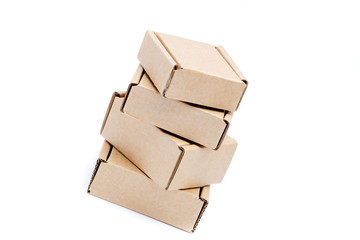 Cardboard boxes of various sizes isolated on white background.