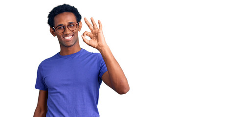 African handsome man wearing casual clothes and glasses smiling positive doing ok sign with hand...