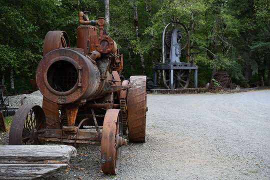 Vintage steam powered logging tractor. - Powered by Adobe