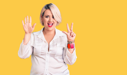 Young blonde plus size woman wearing casual shirt showing and pointing up with fingers number eight while smiling confident and happy.