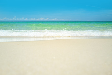 Clouds with blue sky over calm sea beach in tropical beach. Sea beach with blue sky sand sun. Beautiful sea summer or spring abstract background.
