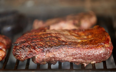 Ready barbecue grilled beef steak on barbecue.space for text. cooking concept