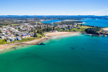 Yamba main beach and ocean pool bath aerial photograph on blue sky sunny day