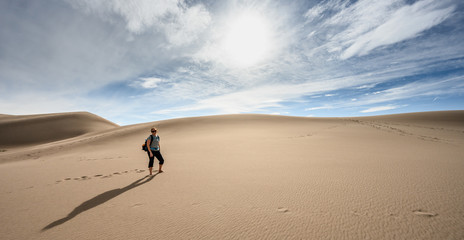 Woman Hiker in Sand Dunes