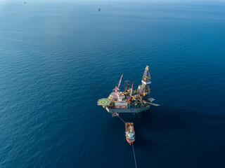 Aerial view from a drone of an offshore jack up rig at the offshore location during day time