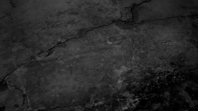 Old cracked concrete walls with slow shadows