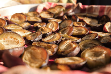 many semi-dried plums - close up selective focus