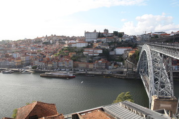 Fototapeta na wymiar View on ancient city Porto,metallic Dom Luis bridge, Ribeira, Porto, Portugal