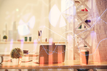 Double exposure of stock market graph drawing and office interior background. Concept of financial analysis.