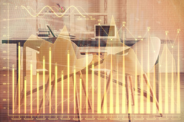 Multi exposure of financial graph drawing and office interior background. Concept of market analysis.