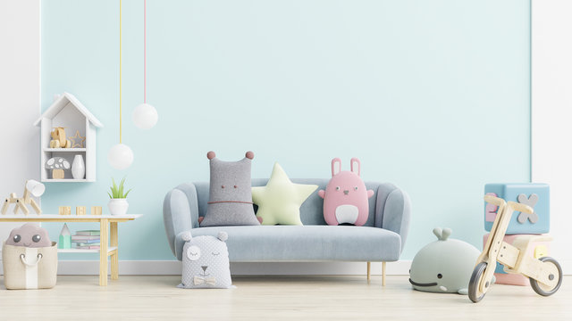 Blue sofa and doll,cute pillows in elegant child's room with mockup wall.
