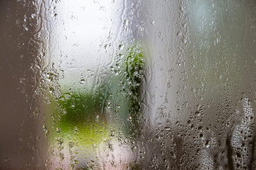 natural behind the wet glass